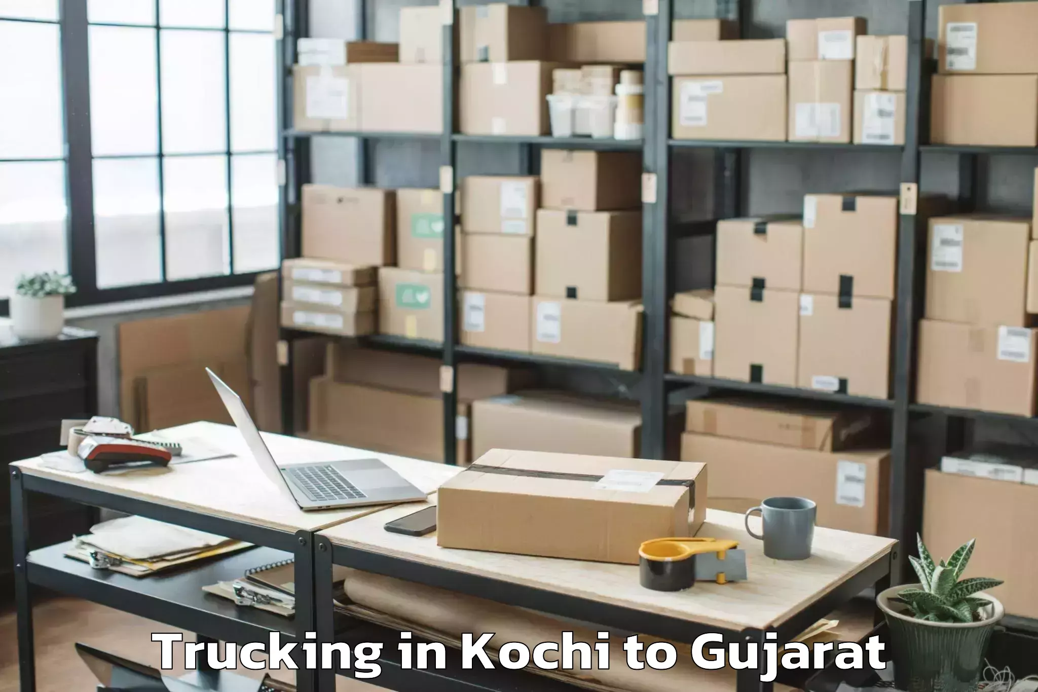 Affordable Kochi to Dharmsinh Desai University Nad Trucking